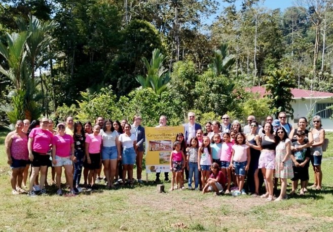 A group photo of those involved in the Costa Rica collaborations, standing outside on a sunny day.